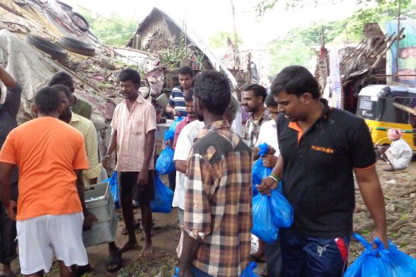 Flood-hit-families-collecting-Mercy-Relief-s-relief-aid