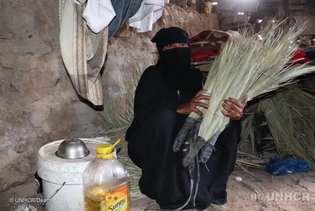 Yemen. Cash helps displaced people generate income in Taizz. Mahfoudha uses palm leaves to make brooms.
Cash assistance helped her buy necessary items to start her project and help her family.
Mahfoudha has eight children, she fled the fighting in her area to another one in Taizz, Yemen. ; From Jan to May 2021, more than 32,000 Yemenis have been forced to leave their homes because of the conflict.
An increasing number of people across Yemen rely on our cash assistance to pay for rent, buy medicine and put food on the table.