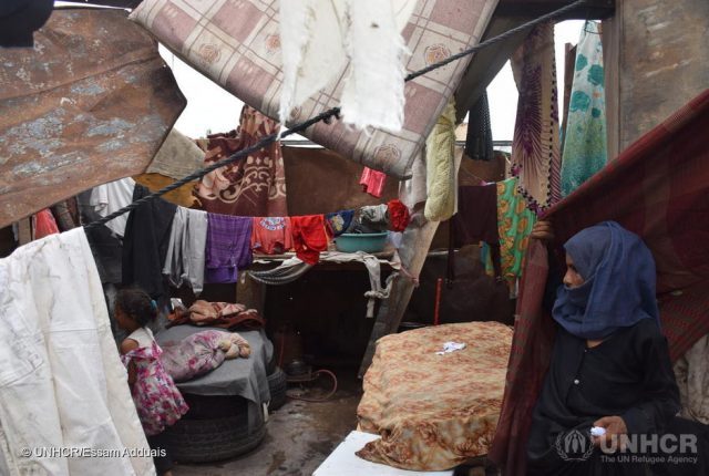 Yemen. Heavy rain and floods affect displaced families in Aden A woman surveys her shelter at a hosting site for internally displaced persons in Aden, Yemen, after heavy rain caused extensive damage on 25 March 2020. ; A rapid assessment of sites was carried out to evaluate damage, needs and priorities. UNHCR-led Camp Coordination and Camp Management Cluster (CCCM) and Shelter teams visited four sites hosting close to 600 families – Ammar Bin Yasser and the Agricultural Saudi Institute in Dar Sa’ad, Al Sawama’a in Al-Mualla and Hosh Al-zira’ah in Khor-Makser. Monitoring showed that about 400 families (2,800 people) have been severely affected – their shelters damaged, food rations lost and core relief items, including mattresses, destroyed. UNHCR is coordinating the response with partners. Since conflict began in 2015, tens of thousands of people have been killed or injured and 3.65 million displaced in Yemen.