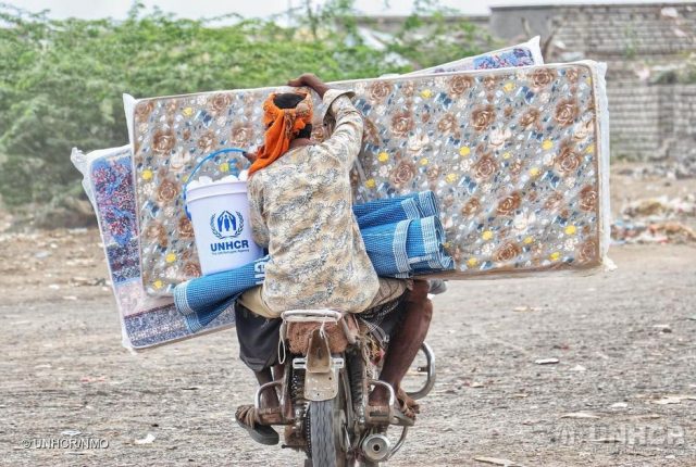 Yemen. Displaced people receive assistance during COVID-19 pandemic Internally displaced Yemenis carry home mattresses and other basic household items, following a UNHCR aid distribution in Hudaydah. ; Named by the UN as the world's worst humanitarian crisis, Yemen has more than 24 million people in urgent need of aid. Yemen is also experiencing the world's largest food security emergency, with more than 20 million people lacking sufficient nutrition, and a displacement crisis that has seen more than 3.6 million people forced to flee their homes because of ongoing conflict since 2015. The coronavirus pandemic is increasing the hardship and only half of the country’s health facilities are fully functioning. UNHCR is helping vulnerable displaced Yemenis with basic household items, cash to buy medicine and food, psychosocial services and other assistance. We are also assisting some 280,000 refugees who remain in Yemen.